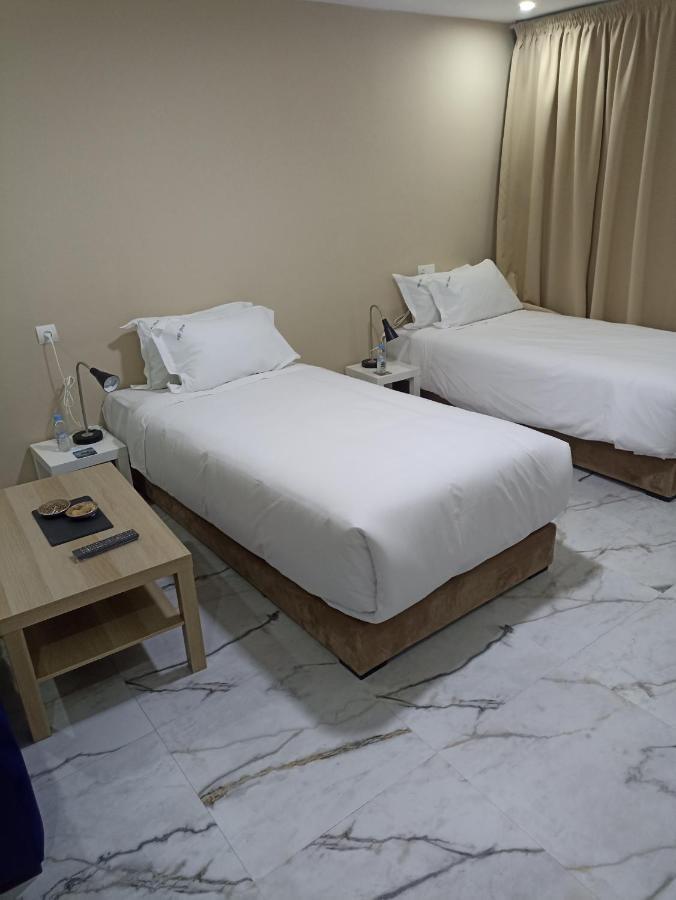 Mji Group Hotel Tan Tan Bagian luar foto