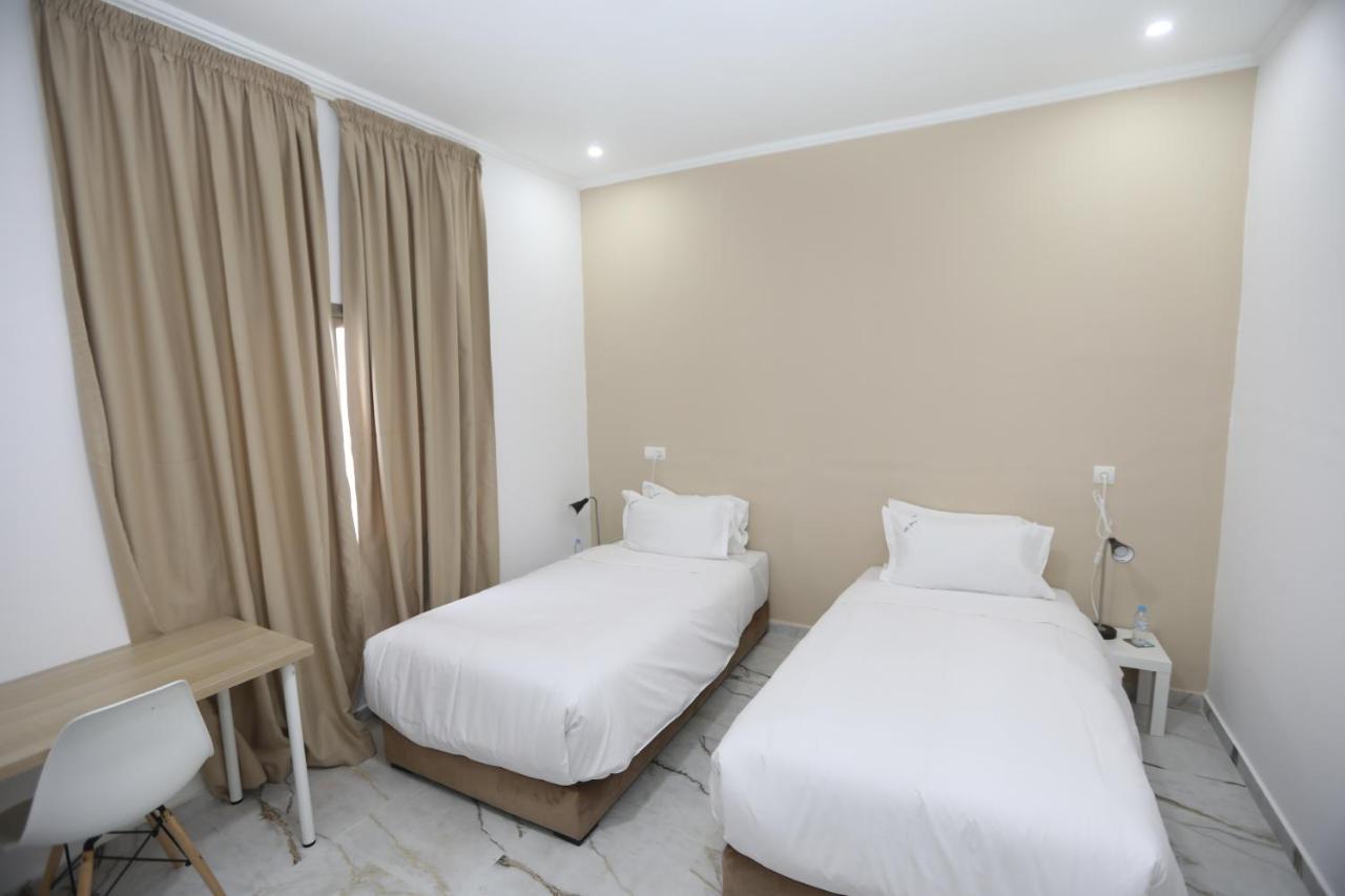 Mji Group Hotel Tan Tan Bagian luar foto