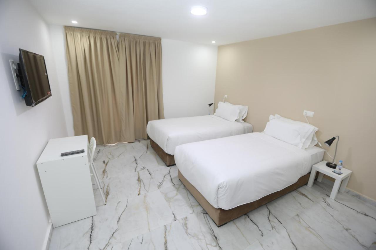 Mji Group Hotel Tan Tan Bagian luar foto