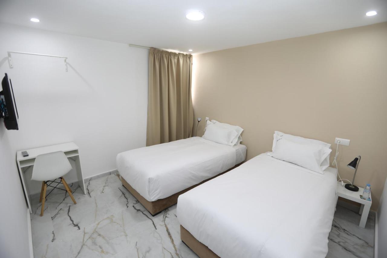 Mji Group Hotel Tan Tan Bagian luar foto