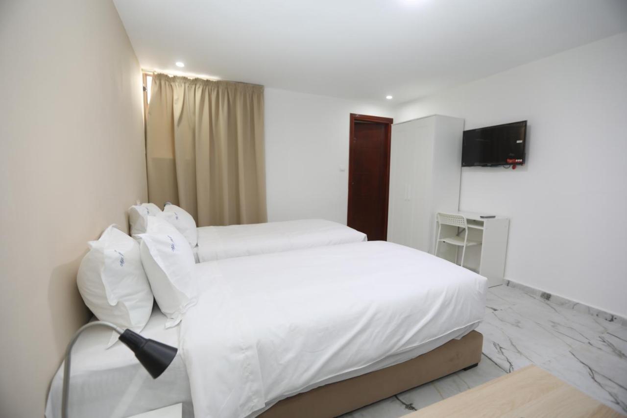 Mji Group Hotel Tan Tan Bagian luar foto