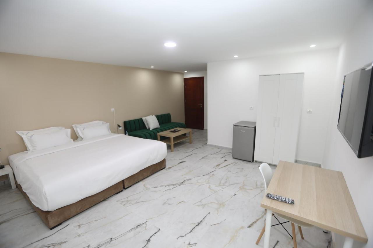 Mji Group Hotel Tan Tan Bagian luar foto