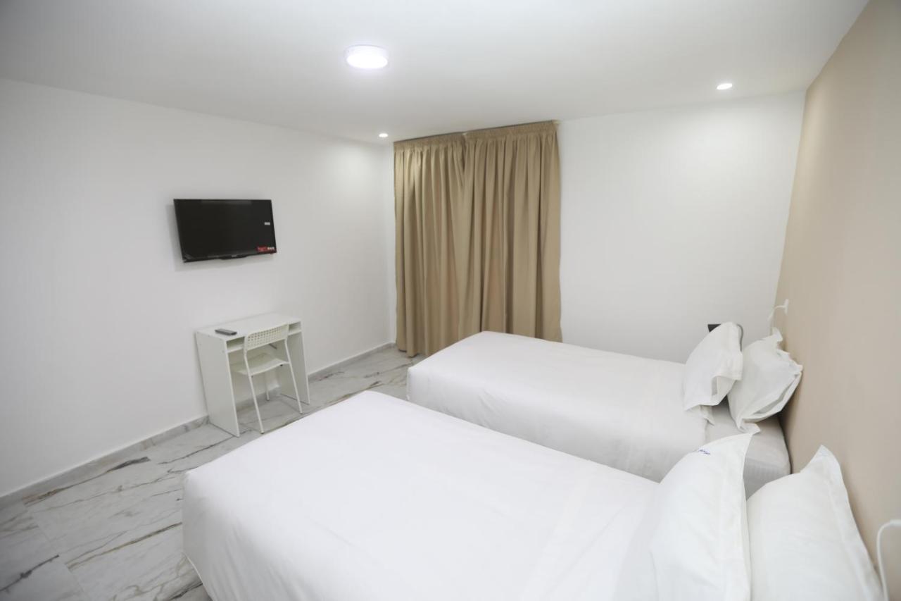 Mji Group Hotel Tan Tan Bagian luar foto
