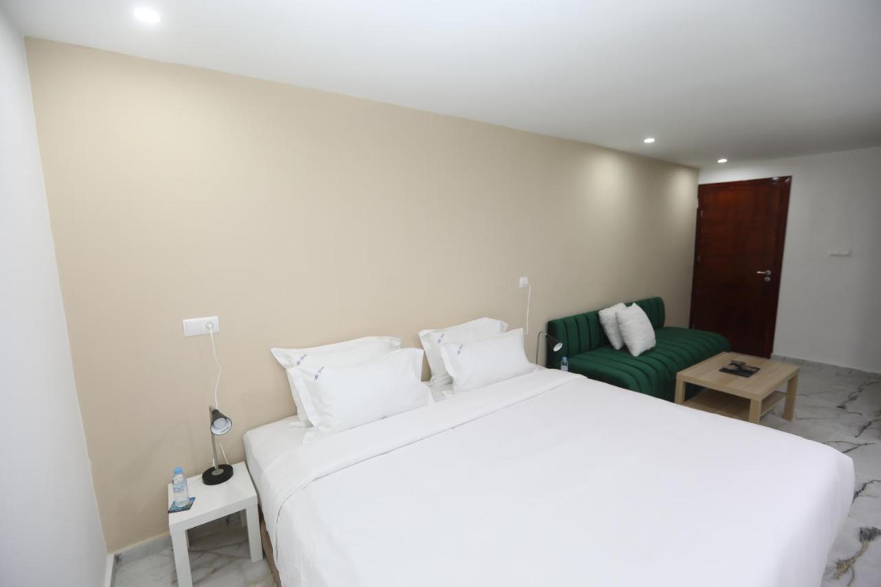 Mji Group Hotel Tan Tan Bagian luar foto