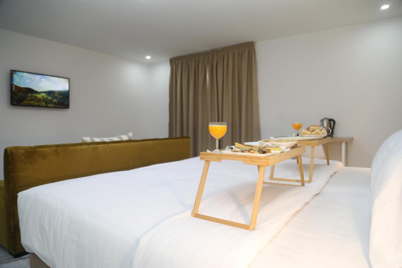 Mji Group Hotel Tan Tan Bagian luar foto