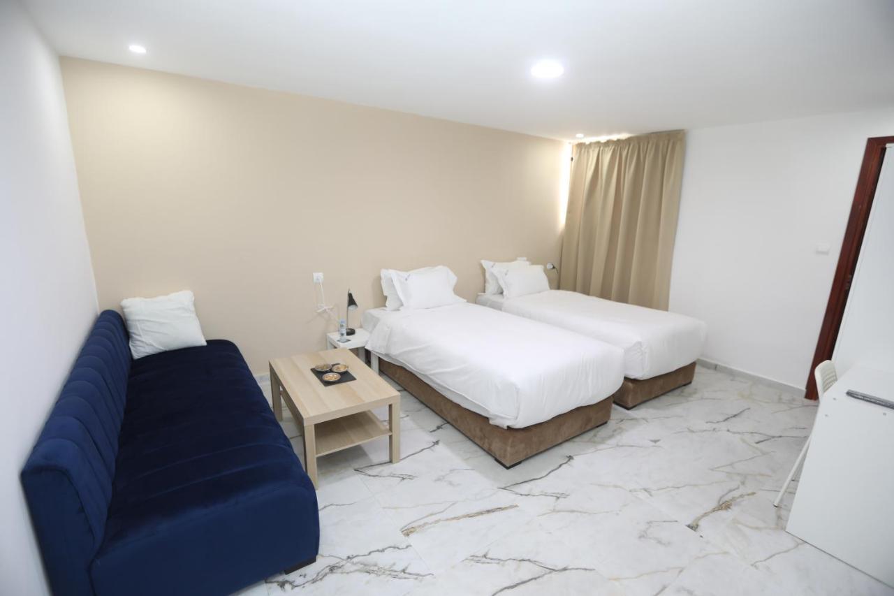 Mji Group Hotel Tan Tan Bagian luar foto