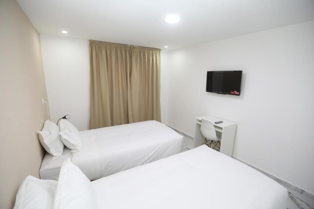 Mji Group Hotel Tan Tan Bagian luar foto