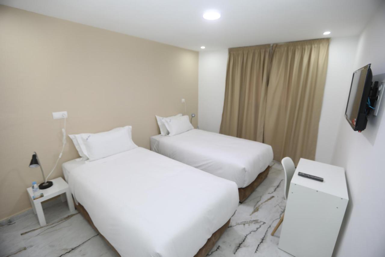 Mji Group Hotel Tan Tan Bagian luar foto